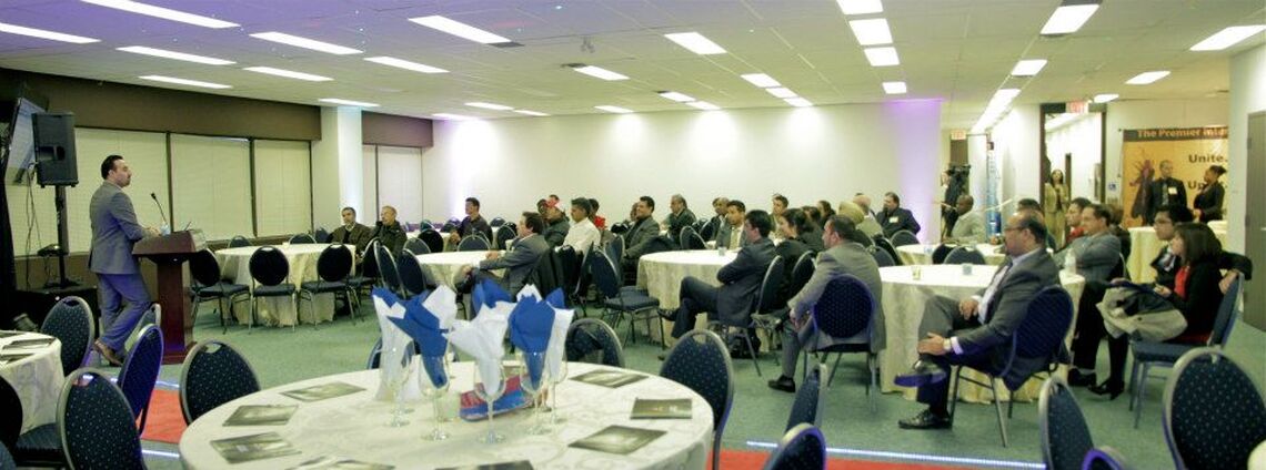Jamshid speaking to a group of real estate investors